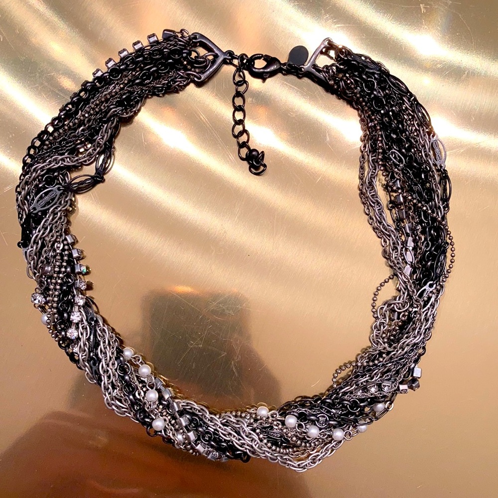Multi-chain, rhinestone and pearl necklace.
